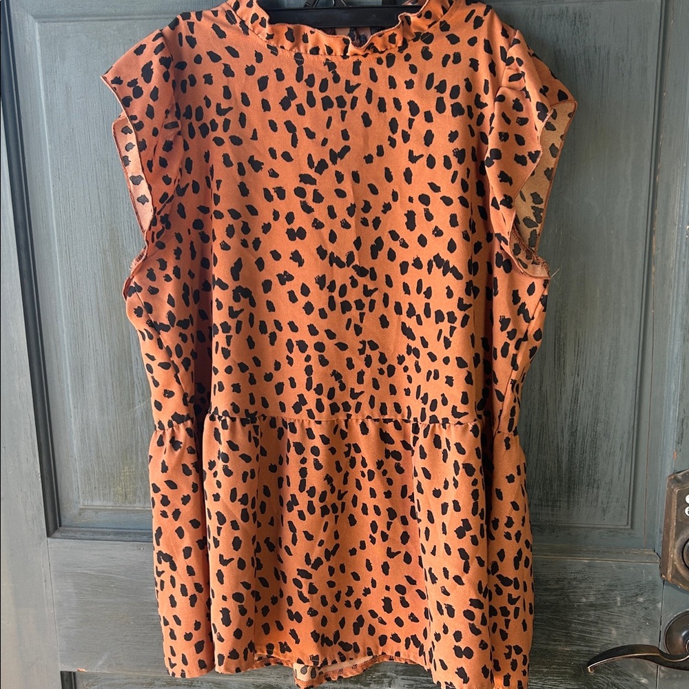 Wild Elegance Sleeveless Leopard Blouse